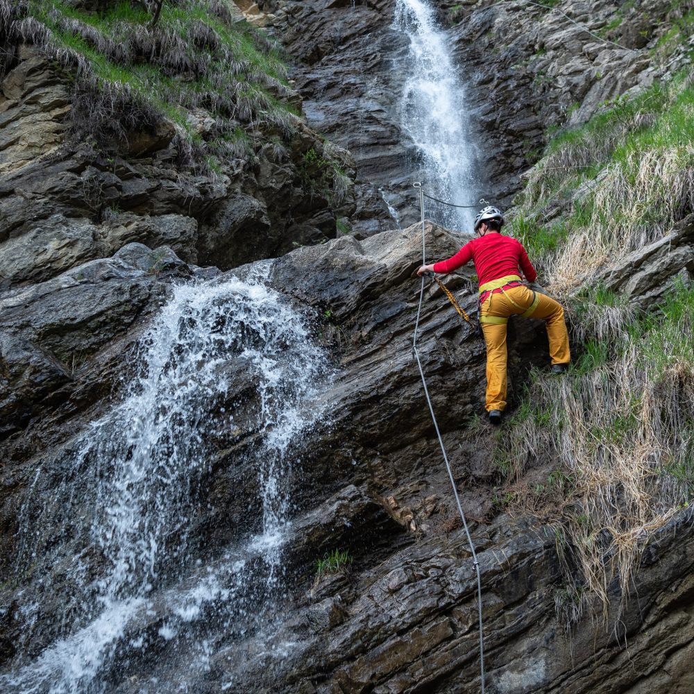 a-female-climbs-a-rocky-via-ferrata-2025-01-15-13-11-03-utc