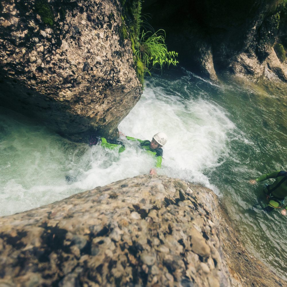Germany, Bavaria, Allgaeu, couple canyoning in Ostertal
